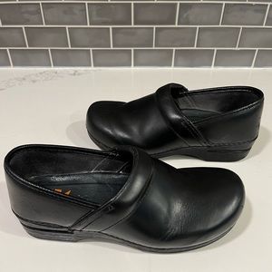 Dansko Women’s Black Leather Clogs